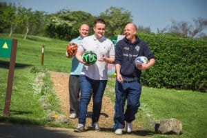 People arriving with footgolf balls
