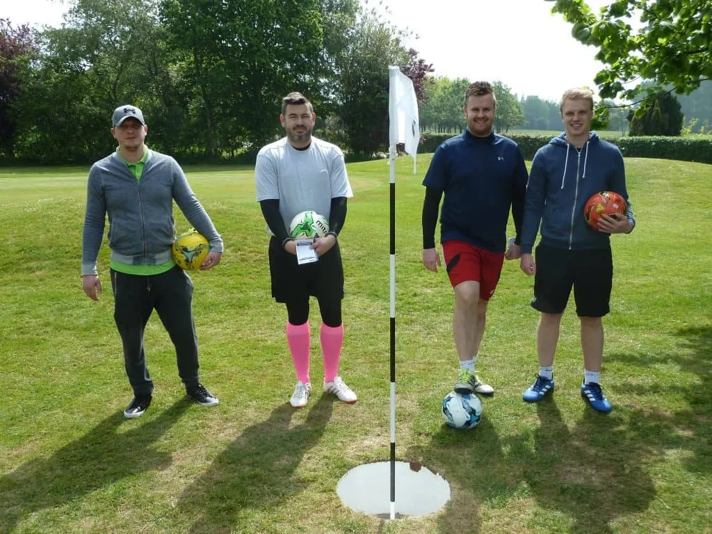 Group with footgolf balls at the course