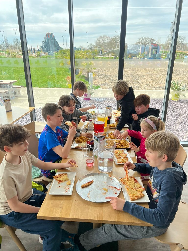 Kids enjoying a meal at the golf dining area