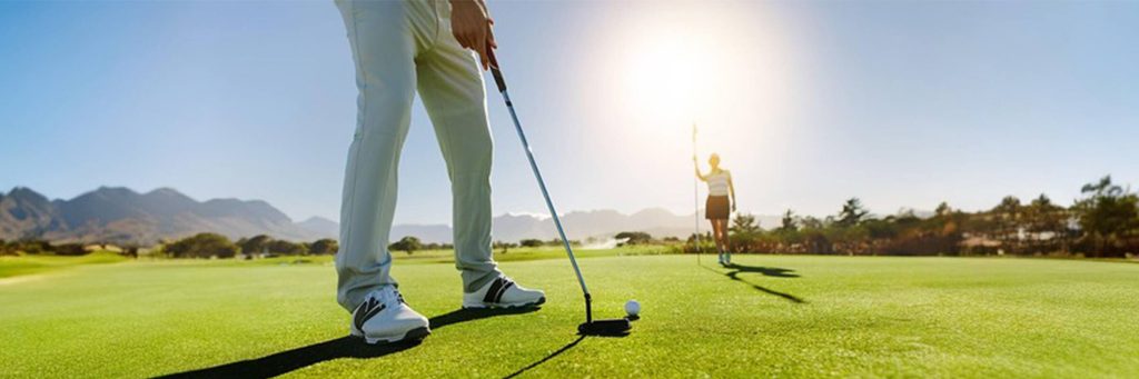 Person enjoying a round of golf